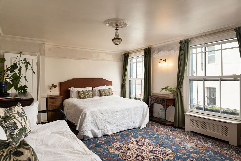 Spacious Doghouse Inn room with two beds